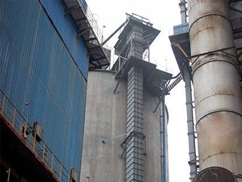 Belt bucket elevator